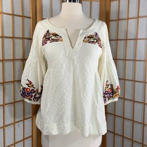 Anthropologie puff sleeve embroidered blouse.